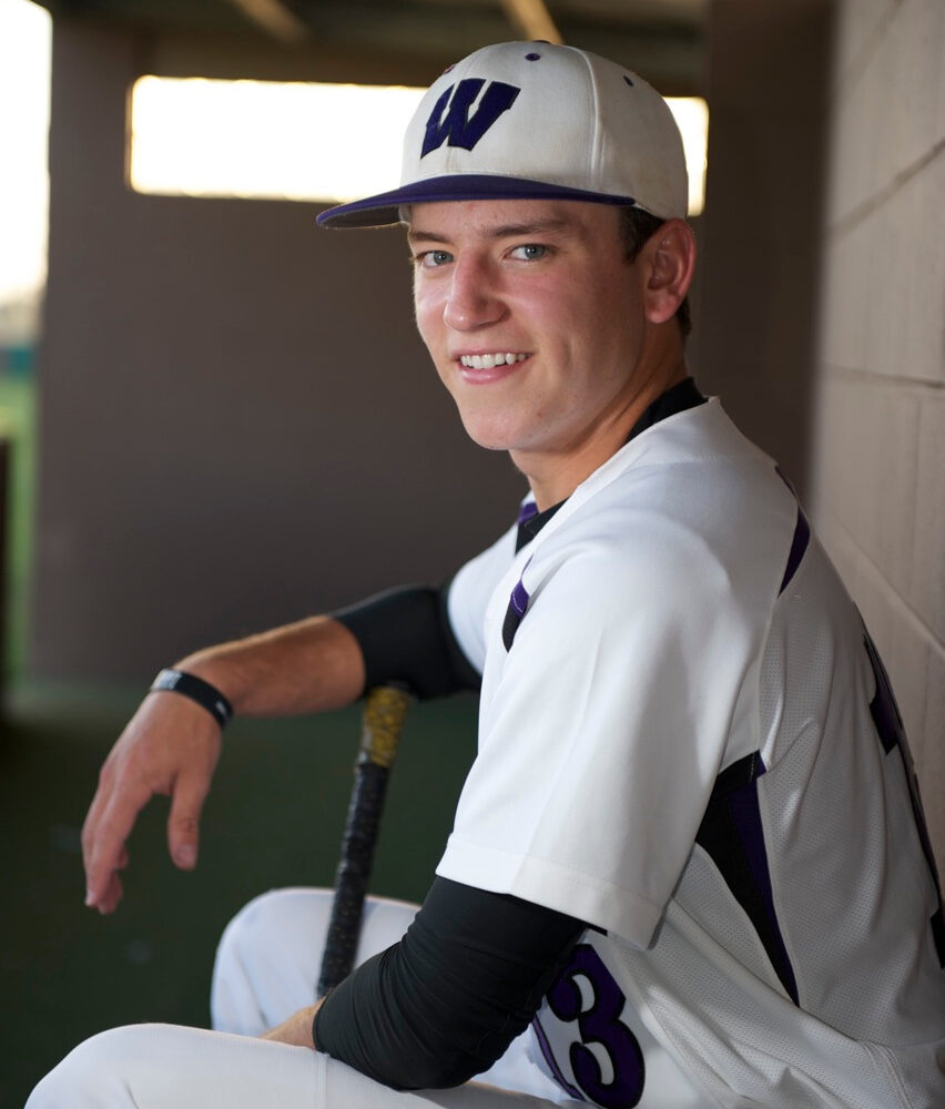cabrera-photography-sports-baseball-portrait.jpg High school baseball player posing with bat in uniform - Cabrera Photography Sports
